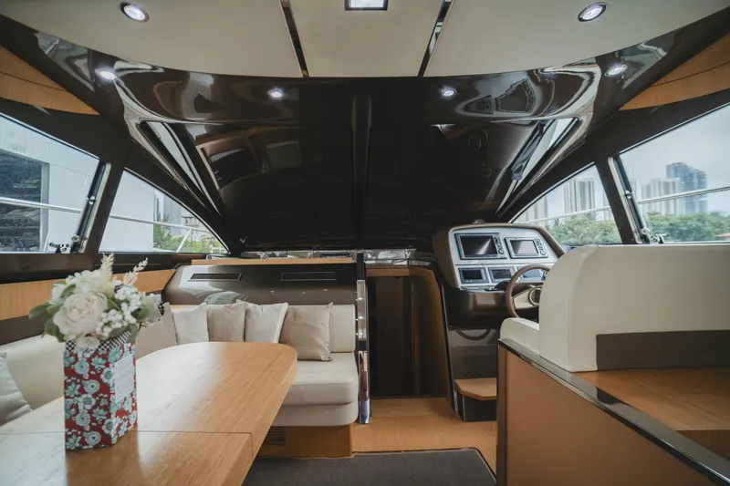 Slide: The Image of Luxurious interior of 2011 Riva SportRiva 56 yacht with modern helm and seating area. - 13