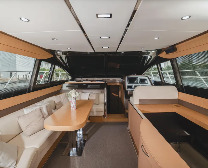 Slide: The Image of Luxurious interior of a 2011 Riva SportRiva 56 yacht with elegant seating and modern design. - 14