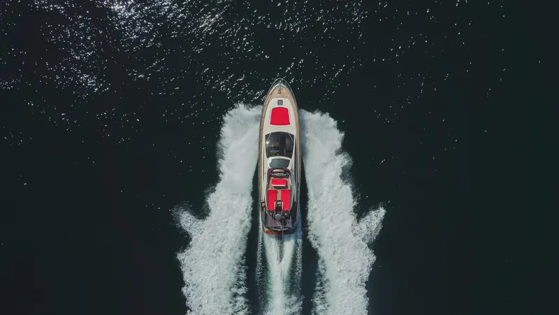 Slide: The Image of Aerial view of 2011 Riva SportRiva 56 yacht cruising on open water. - 2