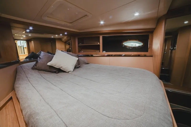 Slide: The Image of Luxurious cabin interior of 2011 Riva SportRiva 56 yacht with cozy bedding. - 23