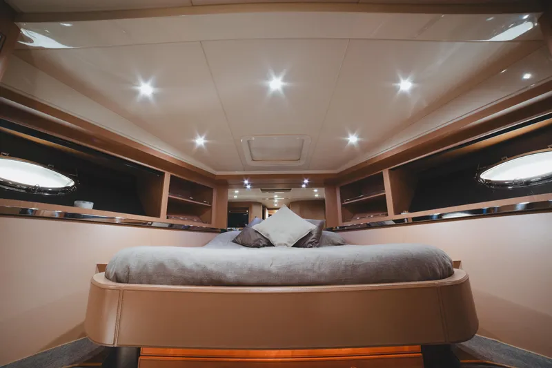 Slide: The Image of Luxurious interior of 2011 Riva SportRiva 56 yacht with elegant bedding and ambient lighting. - 25