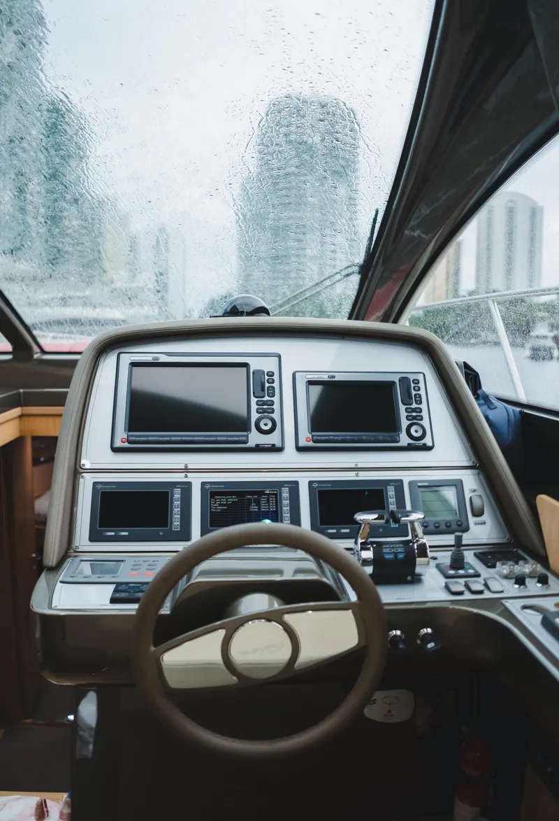 Slide: The Image of Cockpit view of 2011 Riva SportRiva 56 yacht with modern navigation equipment. - 32