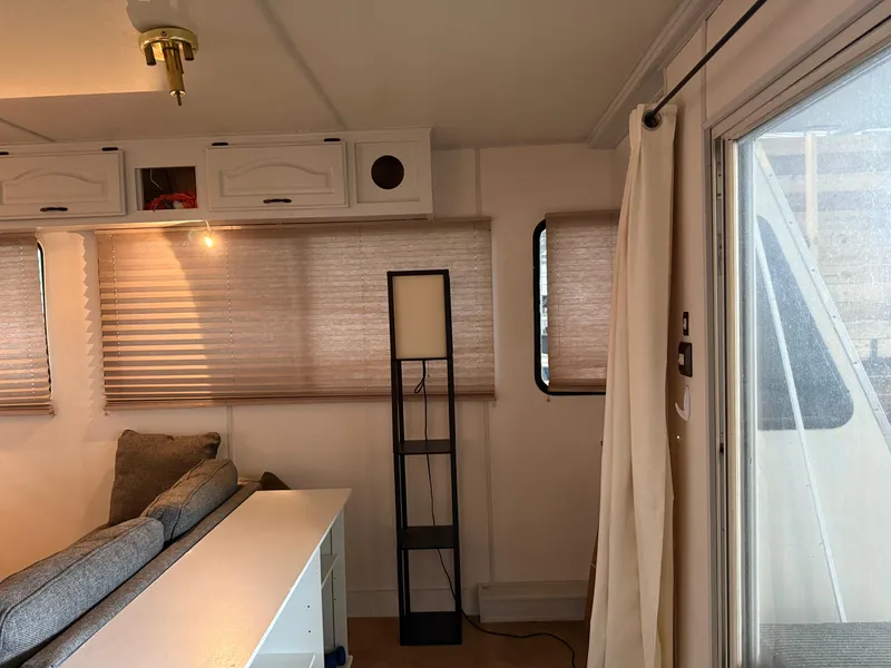 Slide: The Image of Interior of a 2001 Myacht M Yacht with cozy seating and modern decor. - 44