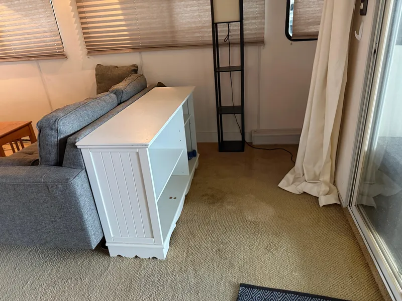 Slide: The Image of Interior of 2001 Myacht M Yacht with sofa, white cabinet, and floor lamp. - 45