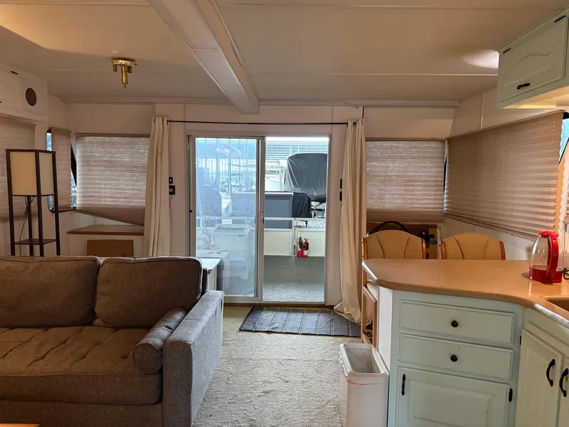 Slide: The Image of Interior of a 2001 Myacht M Yacht with cozy living area and kitchen. - 48