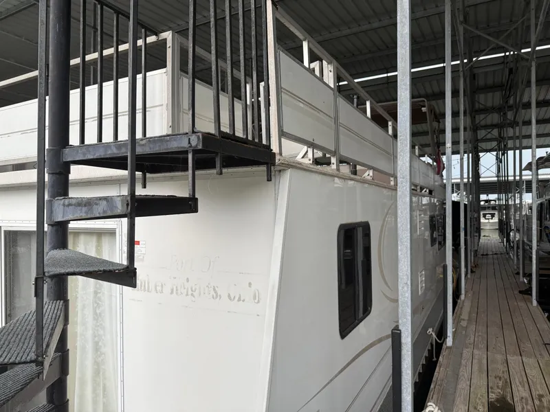 Slide: The Image of 2001 Myacht M Yacht with spiral staircase in covered dock. - 7