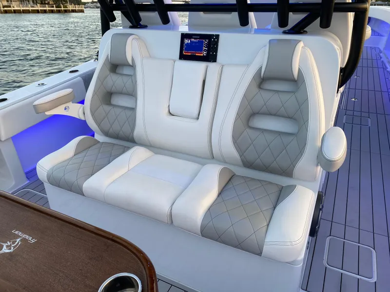 Slide: The Image of Luxurious seating on a 2021 Freeman 42 LR boat with elegant upholstery and modern design. - 7