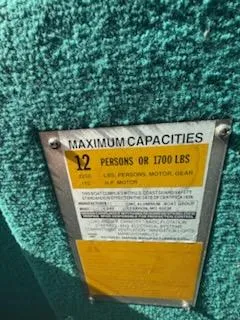 Slide: The Image of Capacity label on 1998 Lowe Family 245 boat, maximum 12 persons or 1700 lbs. - 10