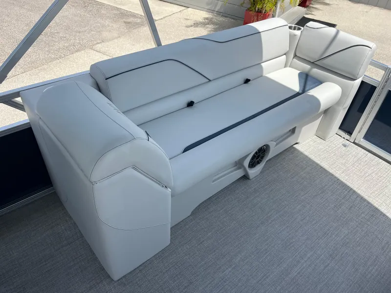 Slide: The Image of 2025 Avalon 2385 Venture 85 Quad Lounger interior with sleek, modern seating design. - 18