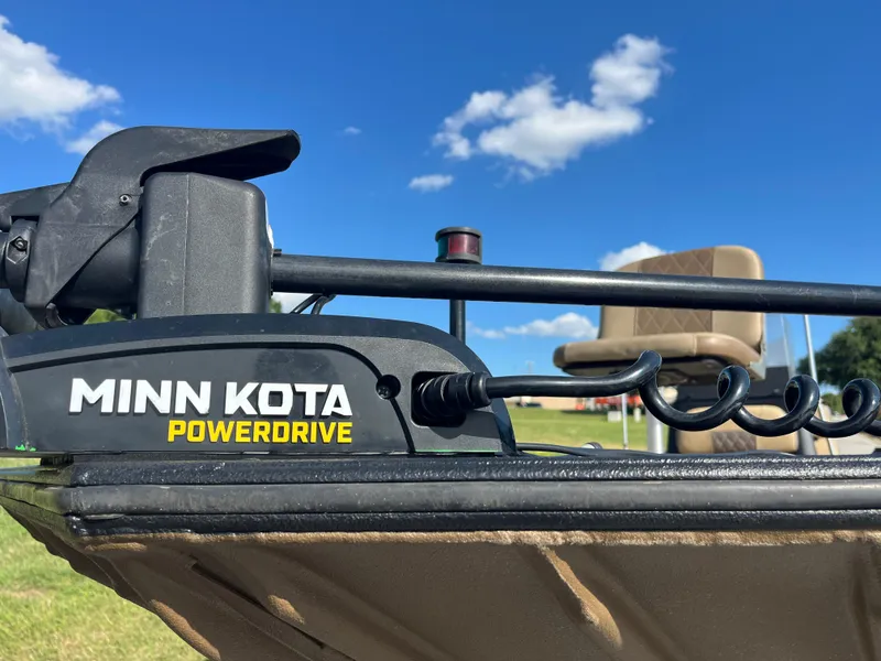 Slide: The Image of 2011 G3 2072cc boat interior with beige seating and steering wheel. - 14