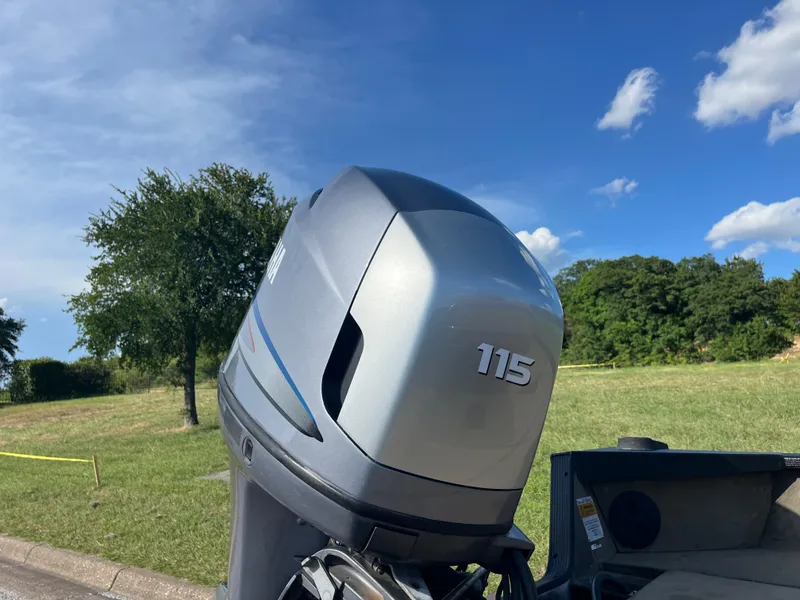 Slide: The Image of Boat with Yamaha four-stroke engine, G3 2072cc model, 2011, parked outdoors. - 17