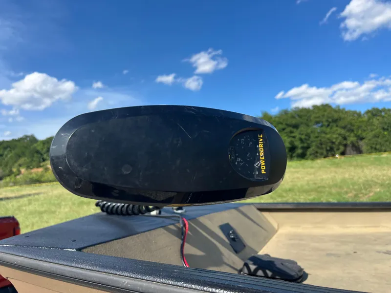 Slide: The Image of Trailer with Gladiator tires and Four Winns branding, parked on asphalt. - 20