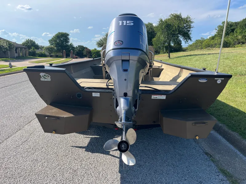 Slide: The Image of Outboard motor propeller of a 2011 G3 2072cc boat on pavement. - 22