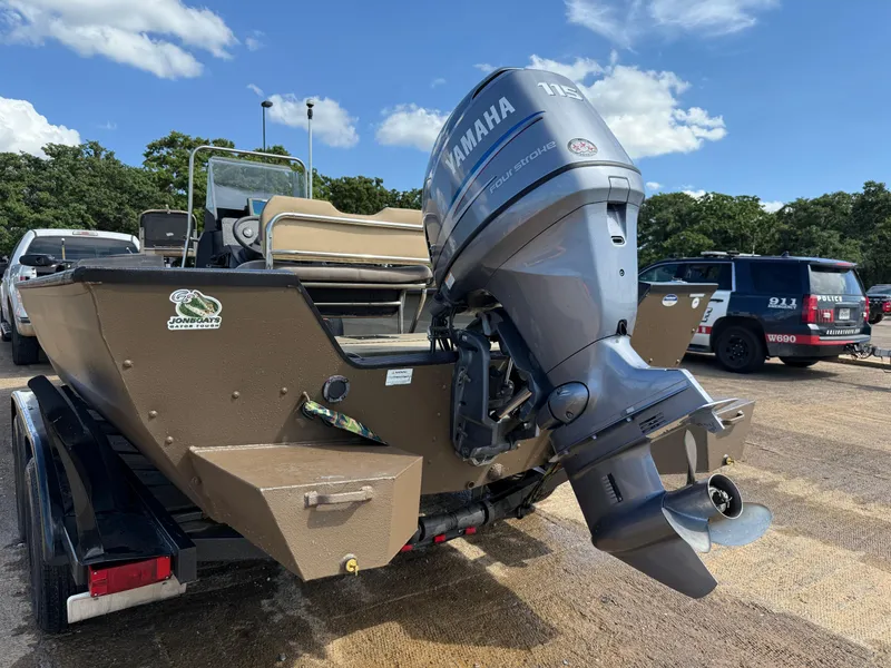 Slide: The Image of Boat with Yamaha outboard motor on trailer, G3 2072cc model, 2011, parked outdoors. - 45