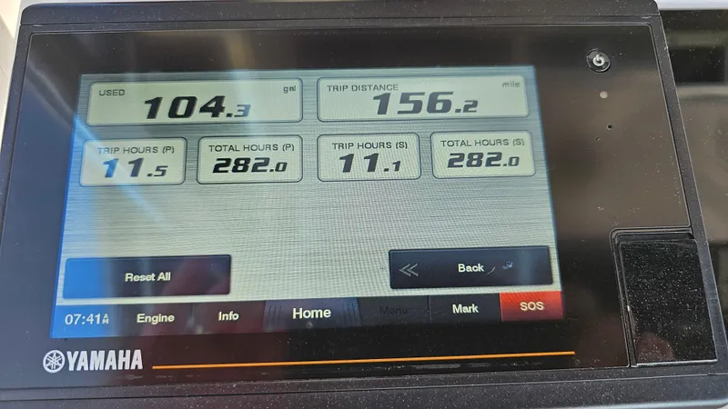 Slide: The Image of Yamaha display showing fuel usage and trip data for a 1999 Donzi 35 ZF boat. - 14
