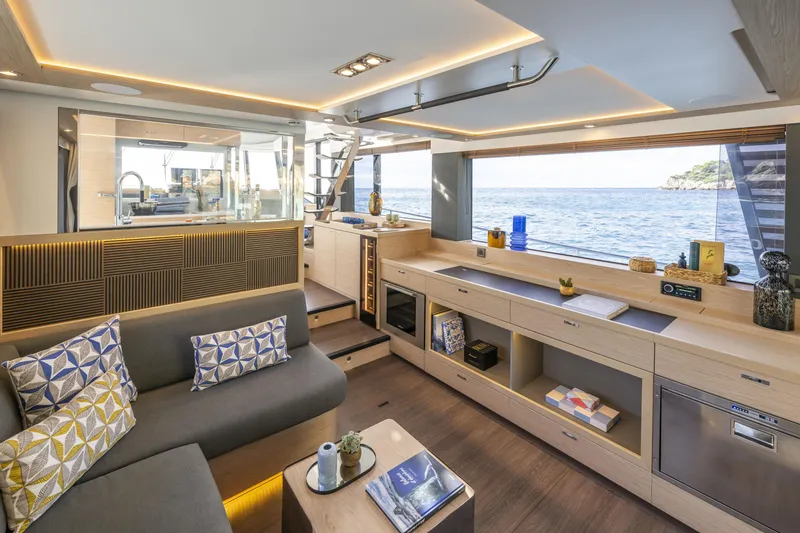 Slide: The Image of Luxurious interior of 2026 Beneteau Swift Trawler 54 with ocean view and modern furnishings. - 15