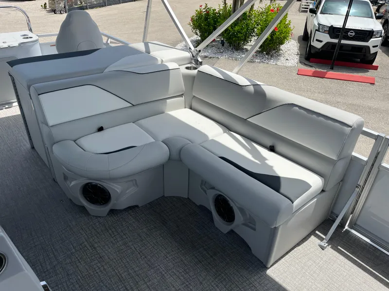 Slide: The Image of 2025 Avalon 2385 Venture 85 Tri Toon boat interior with plush seating and modern design. - 16