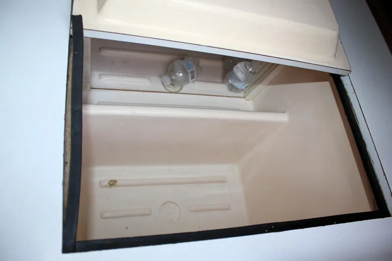 Slide: The Image of Empty storage compartment in a 1976 Bristol 34 boat interior. - 47