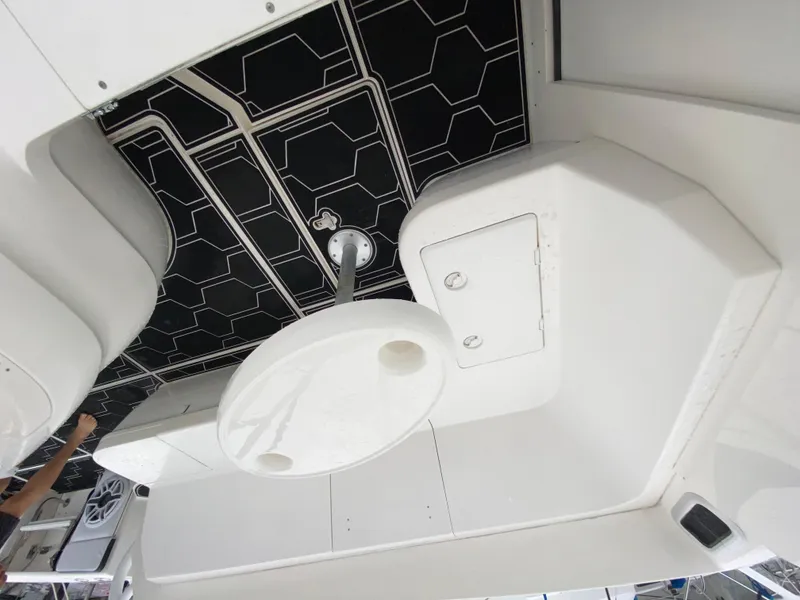 Slide: The Image of 2008 Intrepid 390 Sport Yacht interior with black and white geometric ceiling. - 21