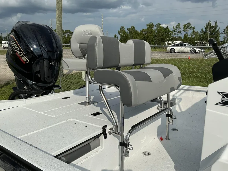 Slide: The Image of 2026 Xpress Hyper-Lift Series H22B boat with dual seats and powerful outboard motor. - 6