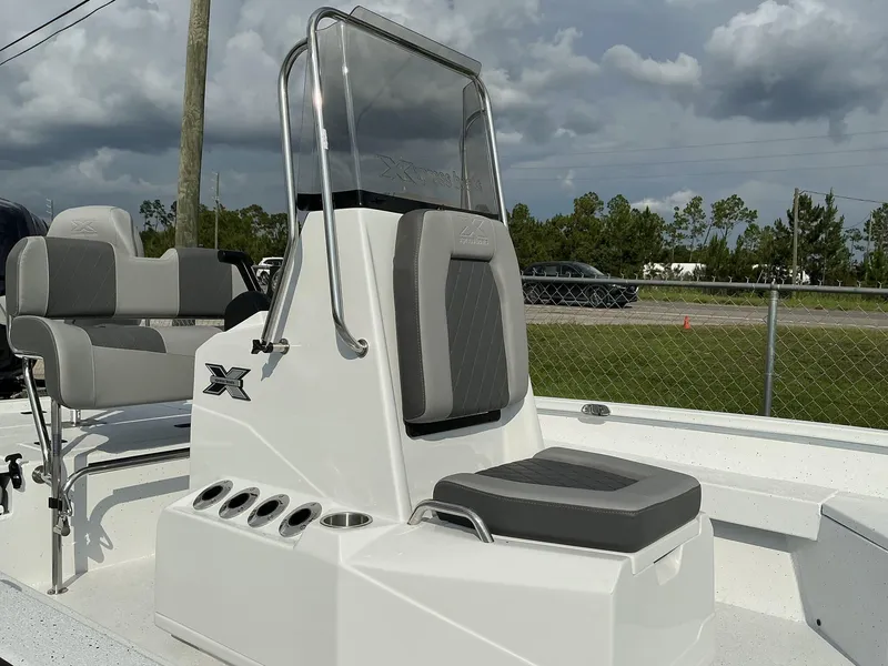 Slide: The Image of 2026 Xpress Hyper-Lift Series H22B boat with sleek seating and console design. - 9