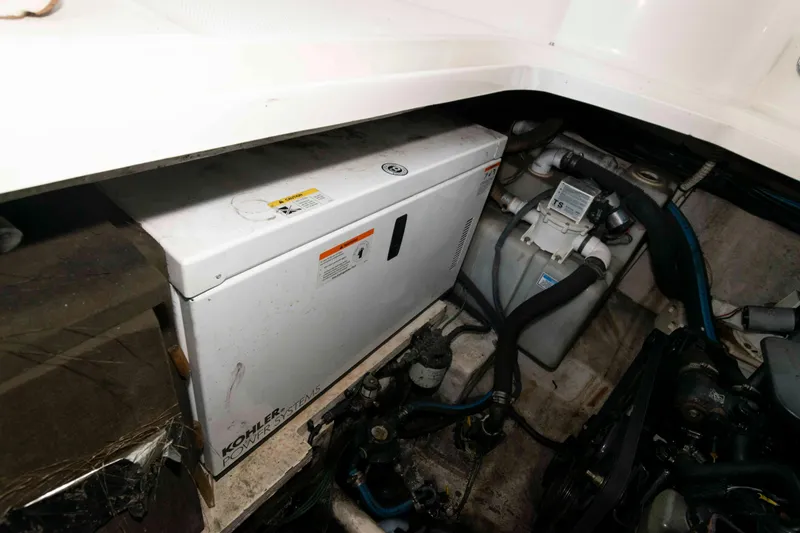 Slide: The Image of Engine compartment of a 2006 Sea Ray 290 Sundancer with Kohler power system. - 6