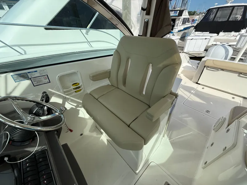 Slide: The Image of 2017 Pursuit DC 325 Dual Console boat helm with Simrad navigation system. - 33