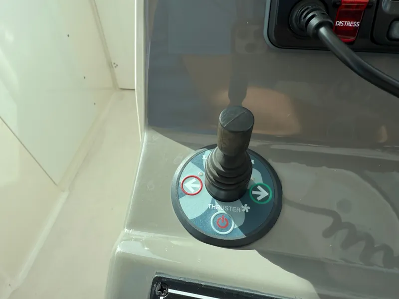 Slide: The Image of Close-up of 2017 Pursuit DC 325 Dual Console boat controls with Yamaha throttle. - 35