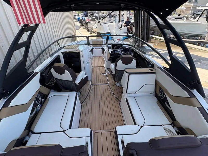 Slide: The Image of 2021 Yamaha Boats 252SE interior with sleek seating and modern design. - 3
