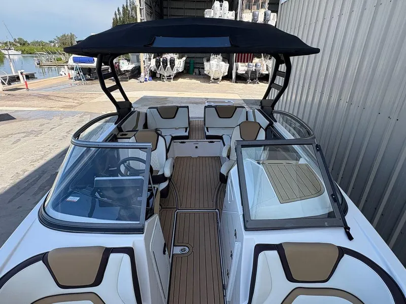 Slide: The Image of 2021 Yamaha Boats 252SE interior with sleek seating and modern design. - 6