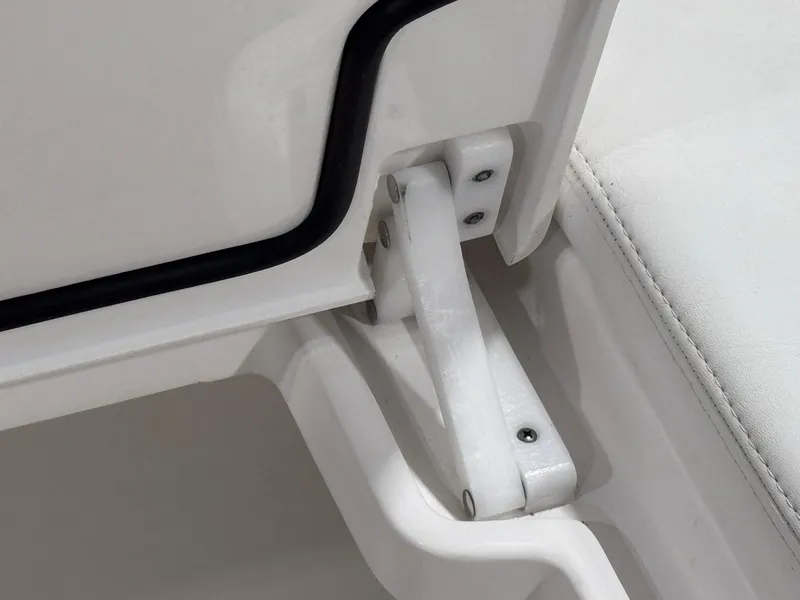Slide: The Image of Close-up of 2024 Contender 44 ST boat hinge and seat detail. - 30