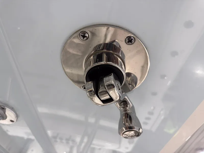 Slide: The Image of Close-up of a 2024 Contender 44 ST boat's stainless steel fishing rod holder. - 36