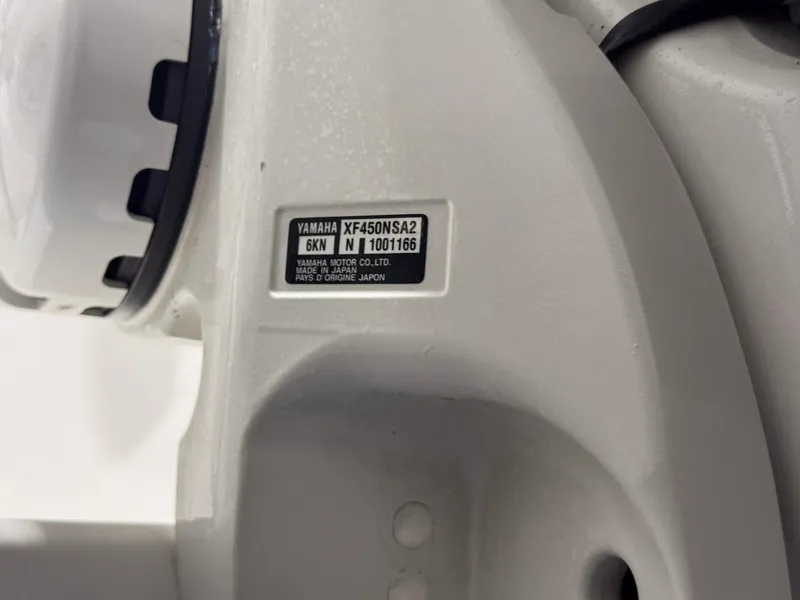 Slide: The Image of Close-up of Yamaha motor label on 2024 Contender 44 ST boat. - 6