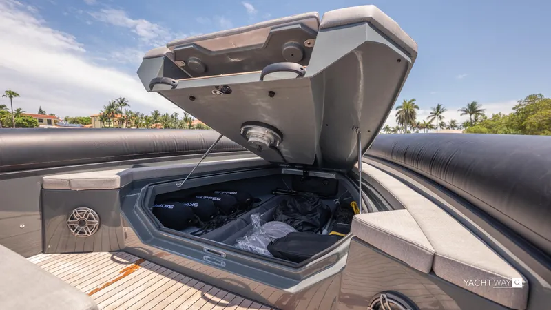 Slide: The Image of Open storage compartment on 2025 Skipper-BSK 38NC boat, showcasing spacious interior and sleek design. - 26