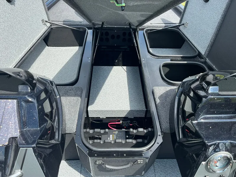 Slide: The Image of 2026 Lund 1875 Renegade SS boat interior storage compartments open. - 11