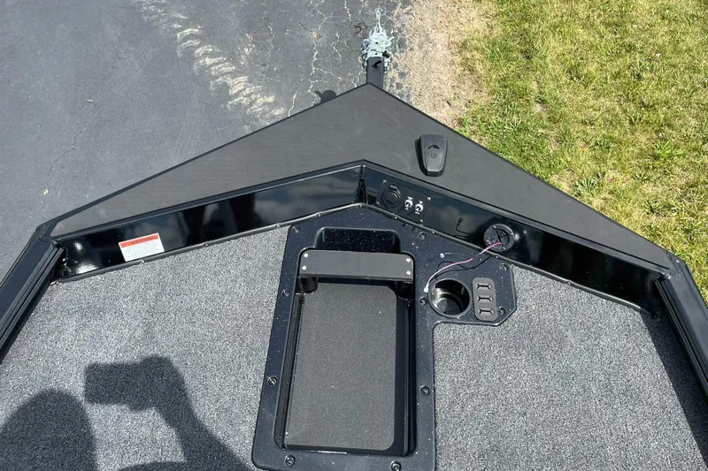 Slide: The Image of Bow view of 2026 Lund 1875 Renegade SS boat on trailer. - 14