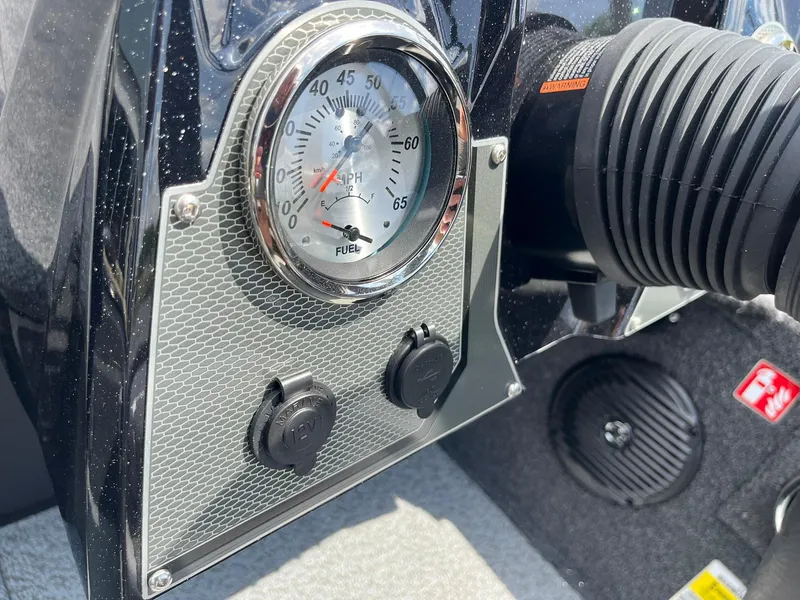 Slide: The Image of Dashboard of 2026 Lund 1875 Renegade SS boat with speedometer and controls. - 18