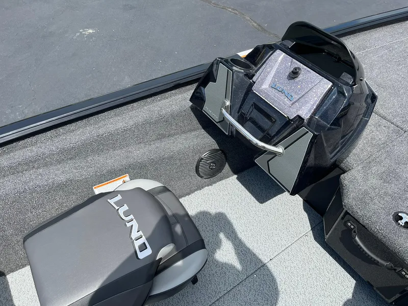 Slide: The Image of 2026 Lund 1875 Renegade SS boat interior with sleek design and modern features. - 19