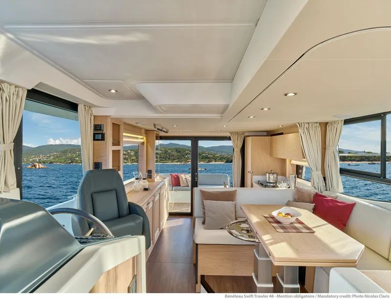 Slide: The Image of Interior of 2026 Beneteau Swift Trawler 48, featuring modern design and scenic ocean view. - 20