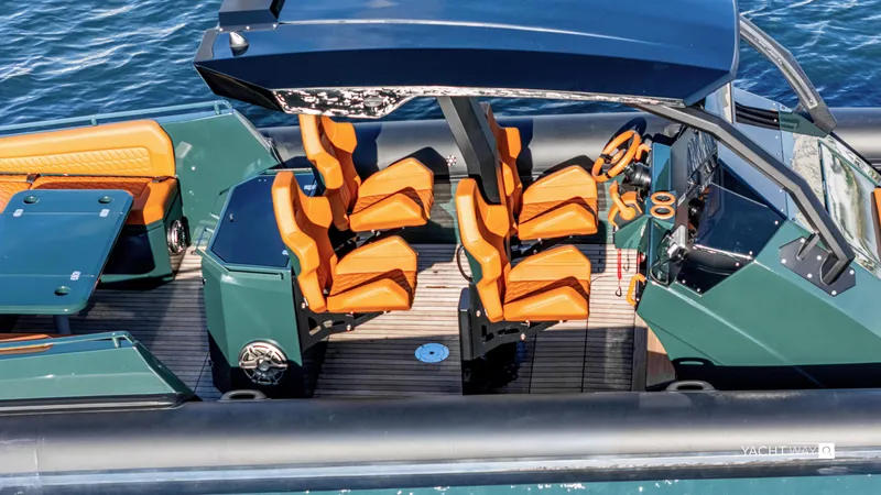 Slide: The Image of Luxury Skipper-BSK 38NC boat interior with orange seats, sleek design, and modern dashboard, 2025 model. - 15