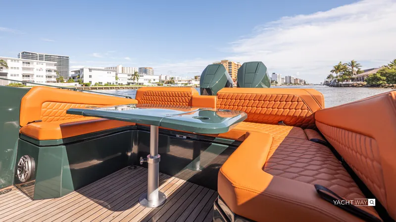 Slide: The Image of Luxurious 2025 Skipper-BSK 38NC yacht interior with orange seating and sleek design. - 20