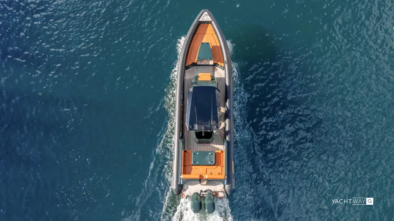 Slide: The Image of Aerial view of 2025 Skipper-BSK 38NC boat cruising on blue water. - 3