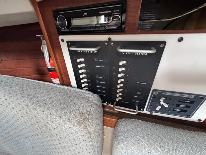 Slide: The Image of Control panel of a 1986 C&C 29 sailboat with 12-volt system switches. - 25