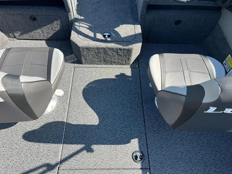 Slide: The Image of Interior of 2026 Lund 1875 Crossover XS boat with two gray seats. - 19