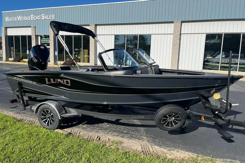 Slide: The Image of 2026 Lund 1875 Crossover XS boat on trailer at Water Werks Boat Sales. - 4