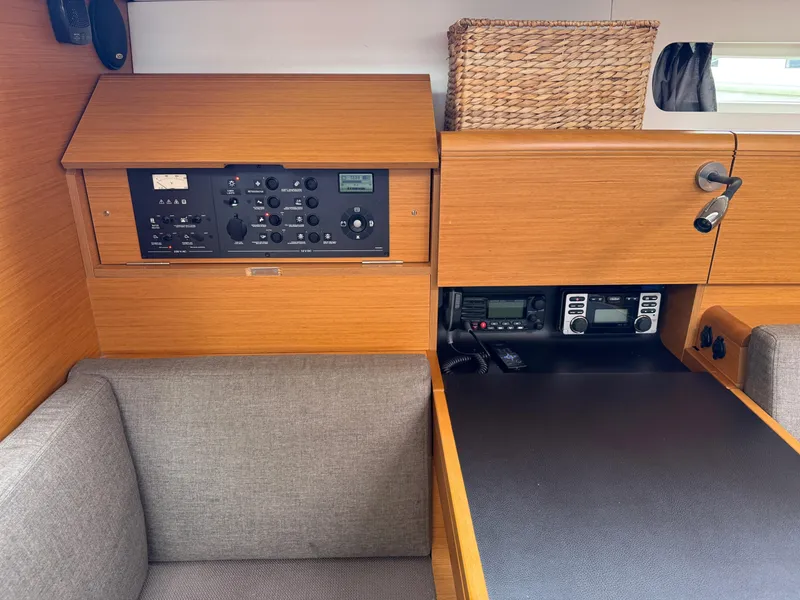 Slide: The Image of Interior of 2011 Jeanneau 409 sailboat with navigation and control panels. - 12