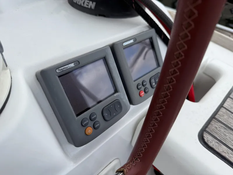 Slide: The Image of Raymarine ST70 displays on 2011 Jeanneau 409 yacht, featuring leather-wrapped steering wheel. - 26