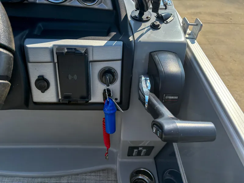 Slide: The Image of Control panel of 2022 Trifecta CS 24RFC boat with Yamaha throttle and ignition key. - 11