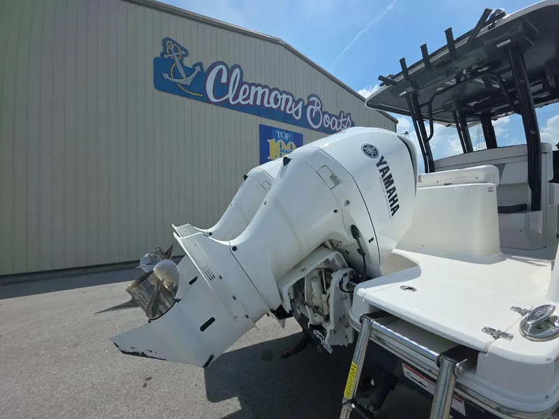 Slide: The Image of 2021 Robalo R272 Center Console with Yamaha engine at Clemons Boats dealership. - 5