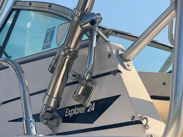 Slide: The Image of 1994 Grady-White Explorer 244 boat, close-up of name and metal fittings. - 3